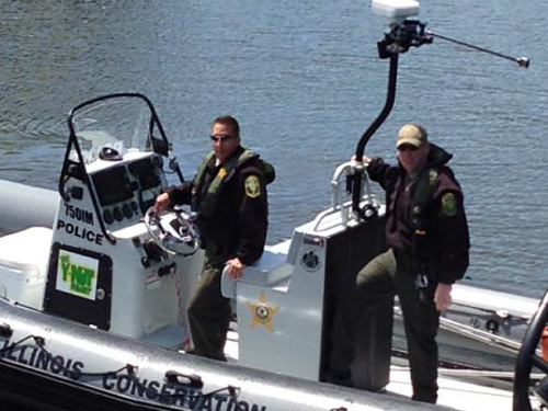 Illinois Conservation Police boat with 2 officers riding