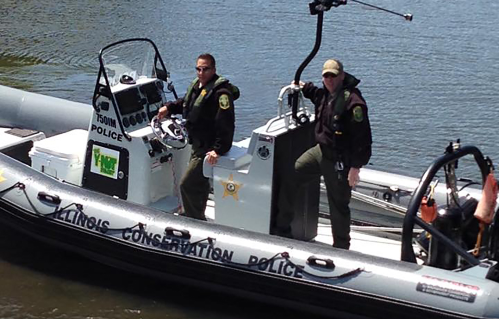 Illinois Conservation Police boat with 2 officers riding